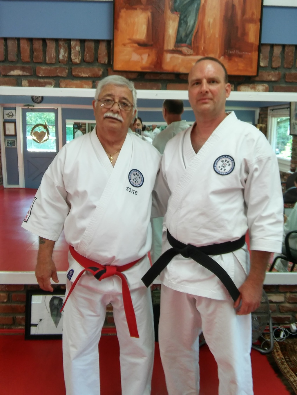 Soke Joseph Ruiz standing with Sensei Todd Irvine